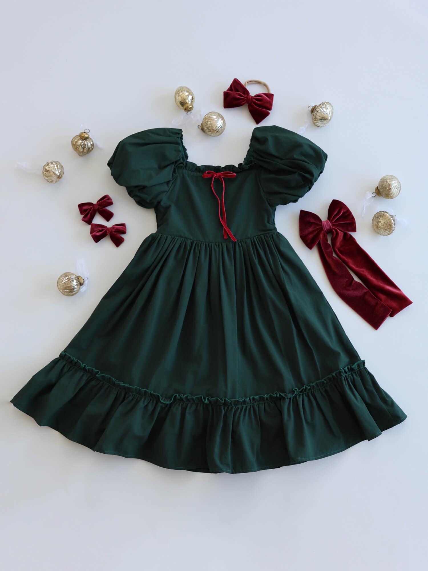 Ava emerald green girls Christmas dress with puff sleeves.