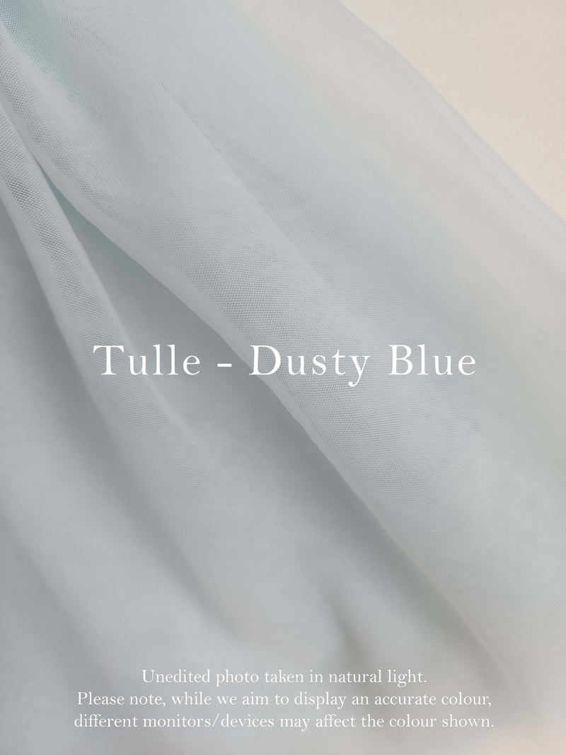Colour swatch showing our dusty blue tulle, which is used to make our Gabrielle dusty blue flower girl romper.