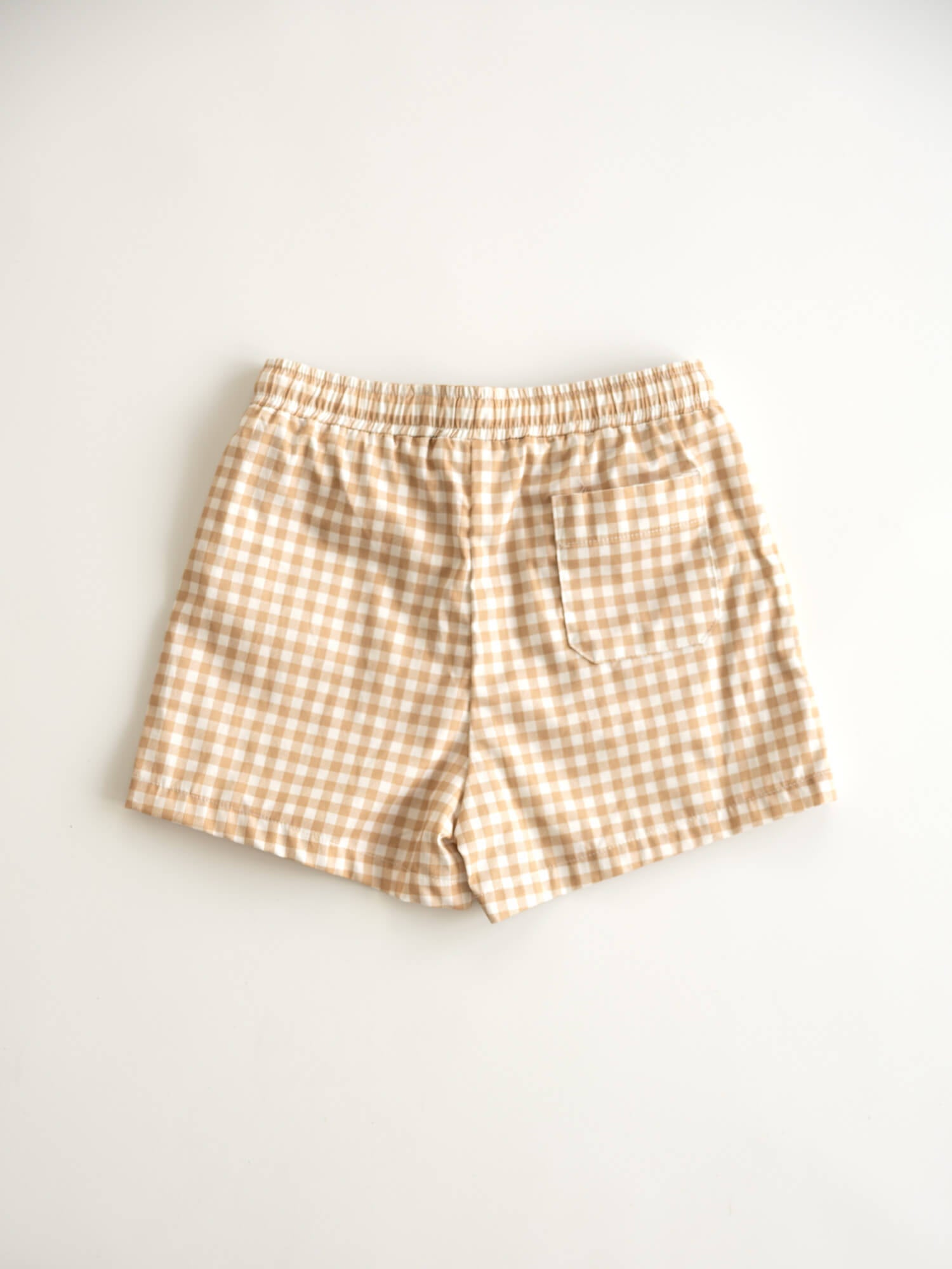 The back of our Noah Gingerbread plaid Christmas shorts.