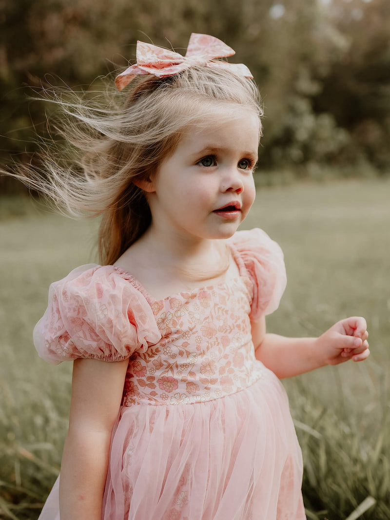 Birdie girls floral tulle dress and matching bow.