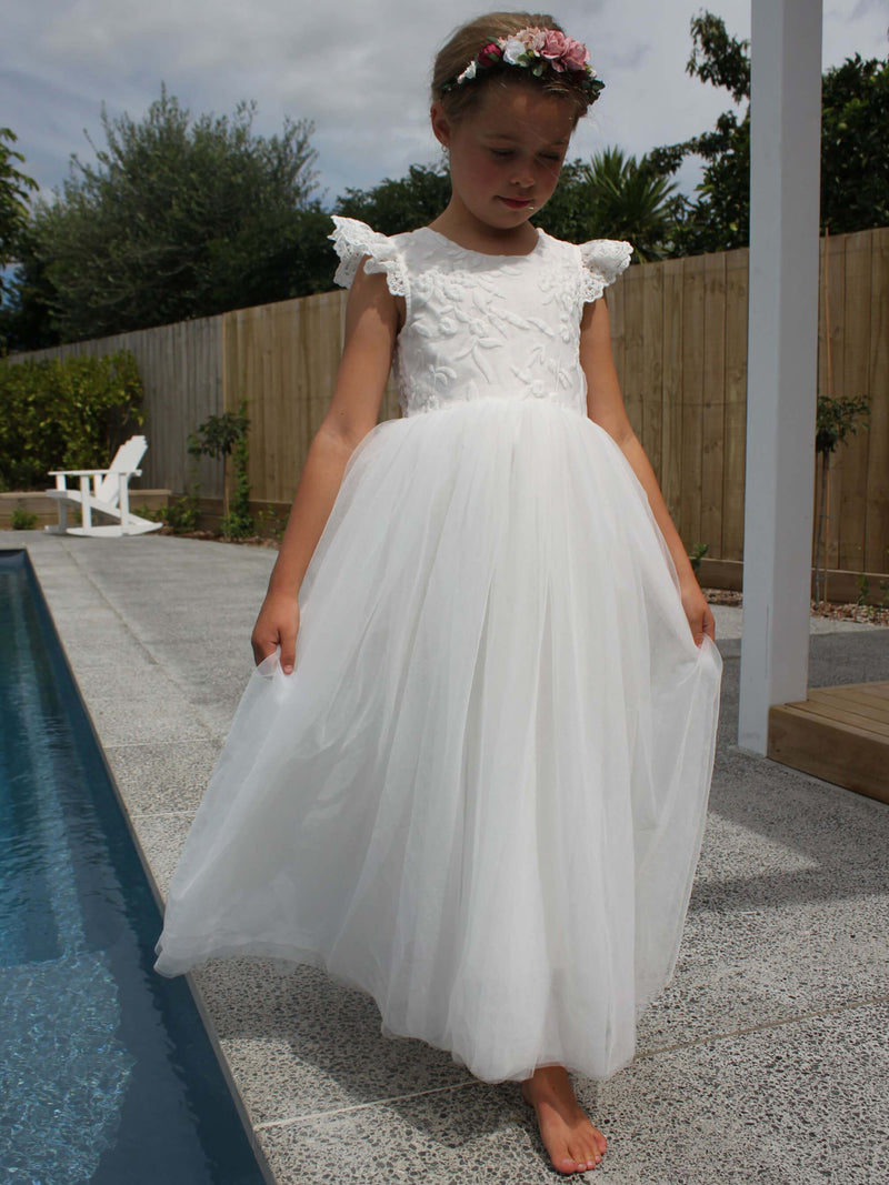 Abigail lace and tulle flower girl dress worn by a young girl, along with our Audrey flower crown.