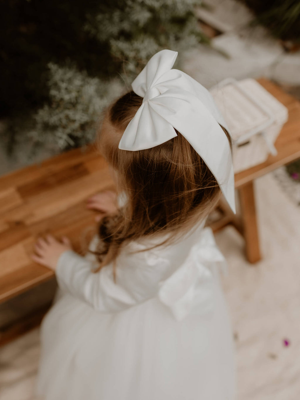Adeline satin bow for flower girls. To match our Adeline satin flower girl dress.