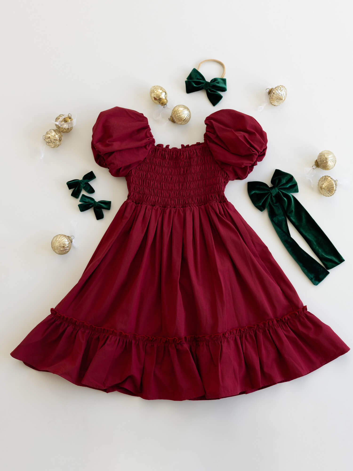 The back of our Ava crimson red Christmas dress, showing the shirring at the back for stretch.