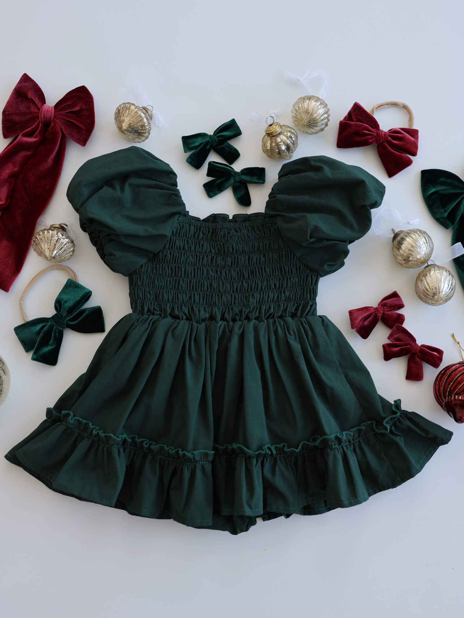 The back of our Ava emerald green Christmas romper.