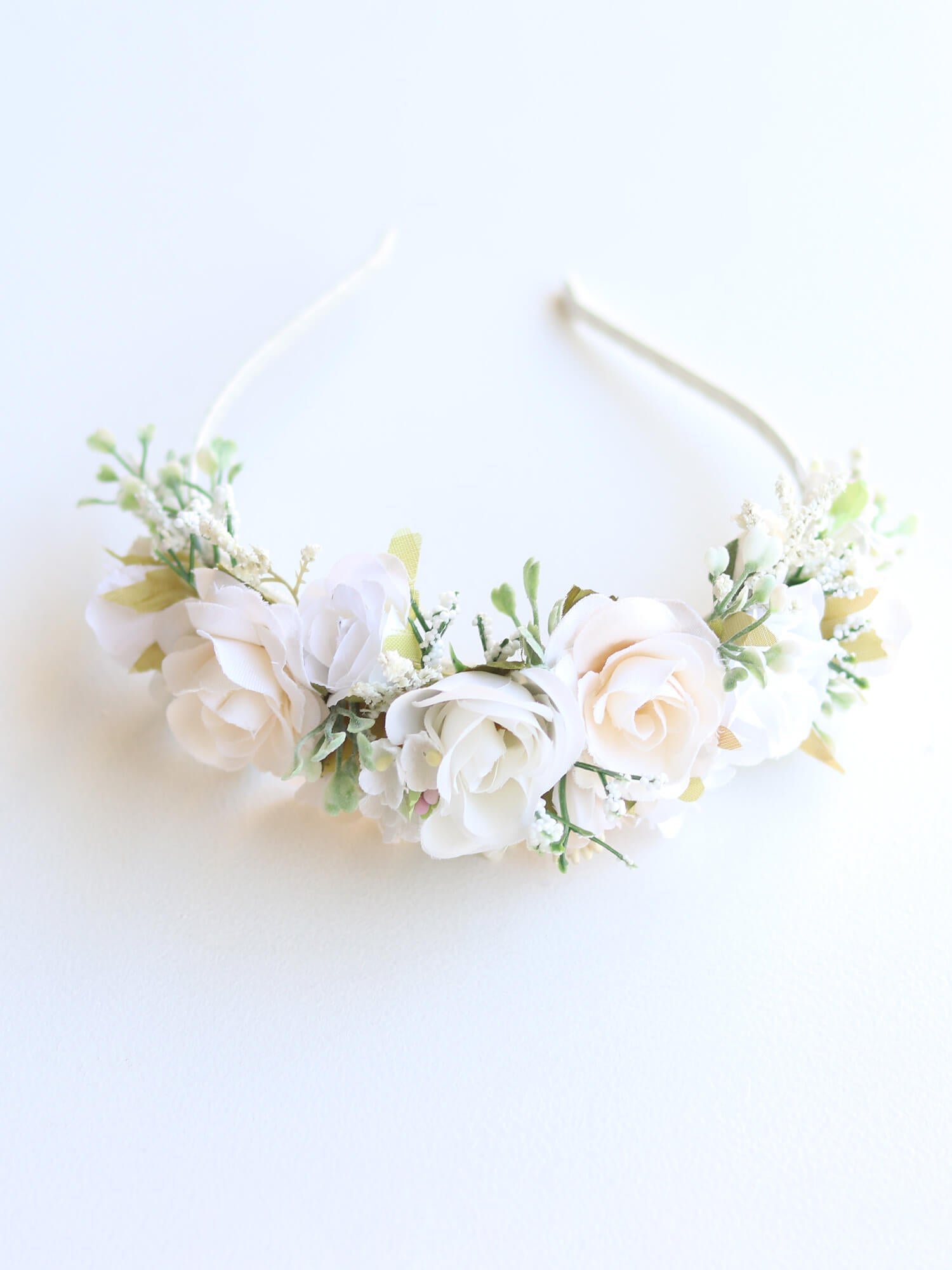 Callie flower girl headband made of ivory florals.