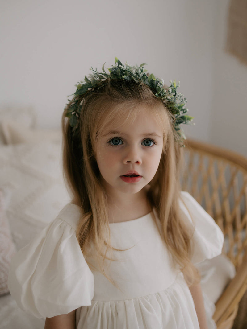 Close view of our Cleo linen flower girl dress and Blythe flower crown.