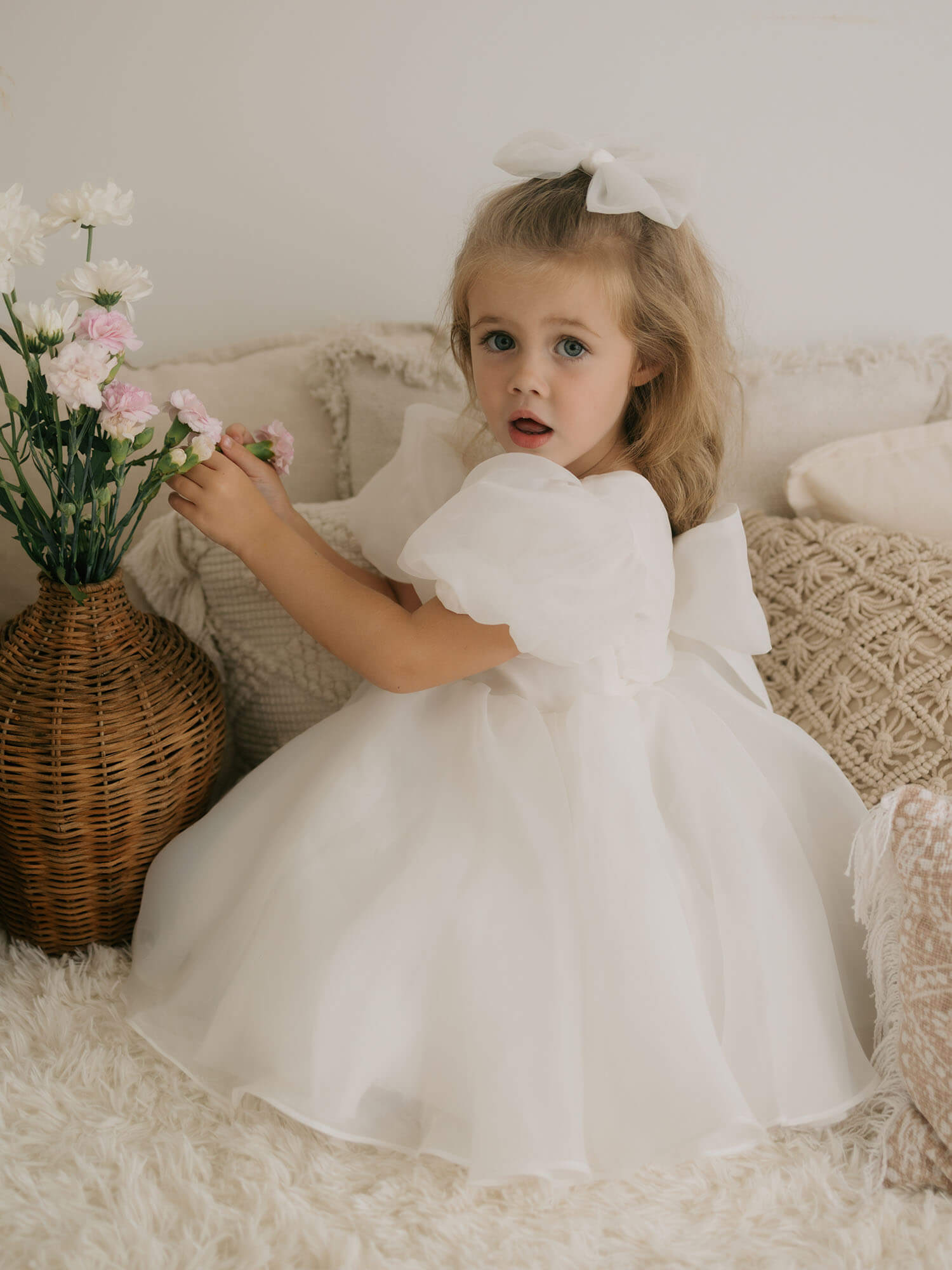 Baby in white dress best sale