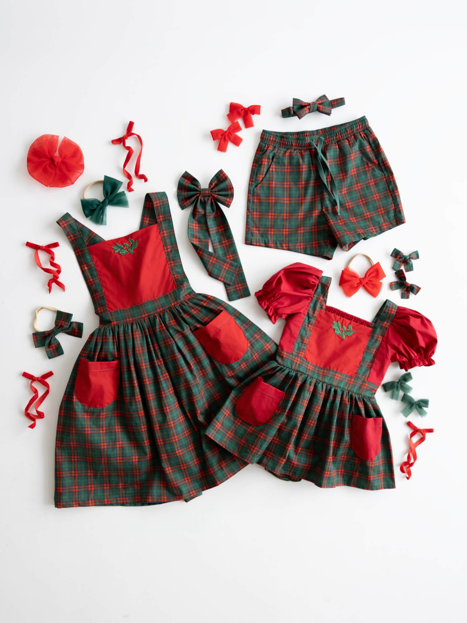 Our Ellie Christmas collection which includes our Ellie tartan Christmas dress, Ellie tartan baby romper and Noah tartan boys shorts, along with tartan bows and bow tie.