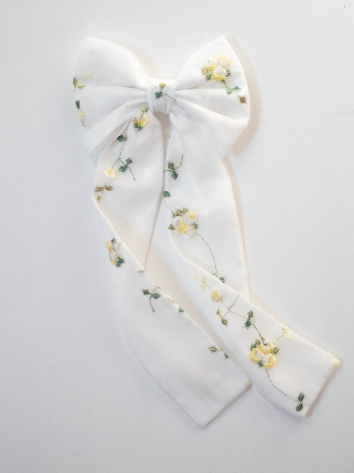 Medium Fleur lemon blossom bow hair clip.