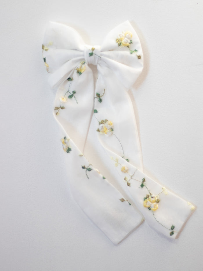 Medium Fleur lemon blossom bow hair clip.