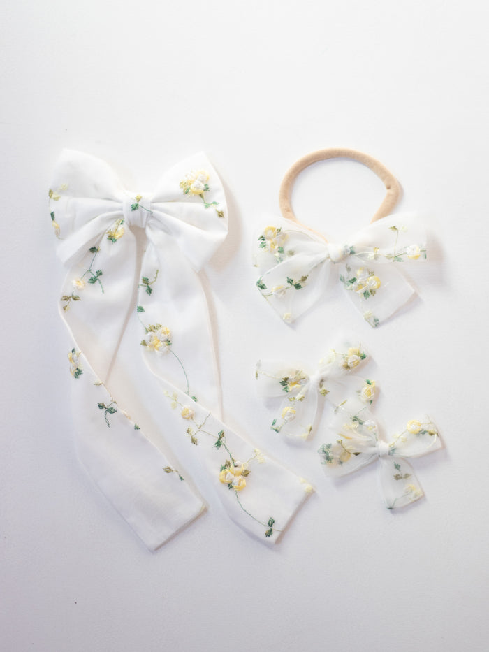 Fleur lemon blossom bows.