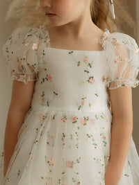 Pink floral embroidery details of our Fleur flower girl dress in Meadow.