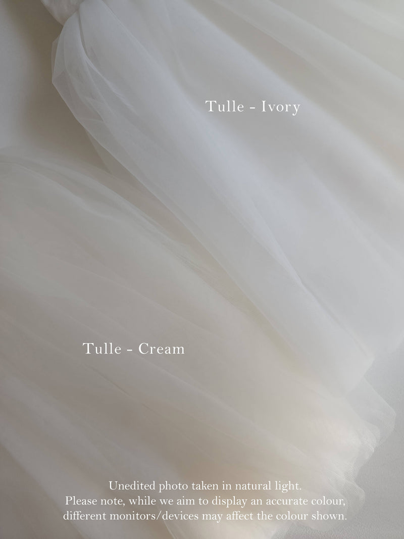 Flower girl dress tulle colours , ivory and cream.
