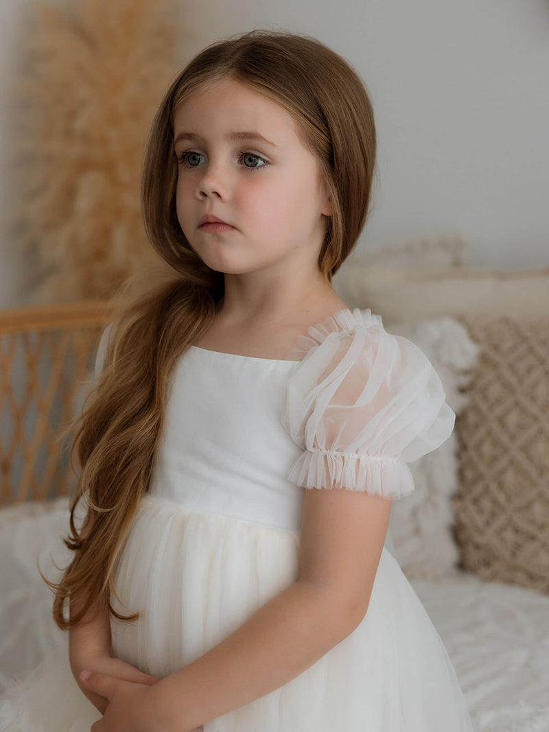 Tulle puff sleeves on our Gabrielle cream tulle flower girl dress.