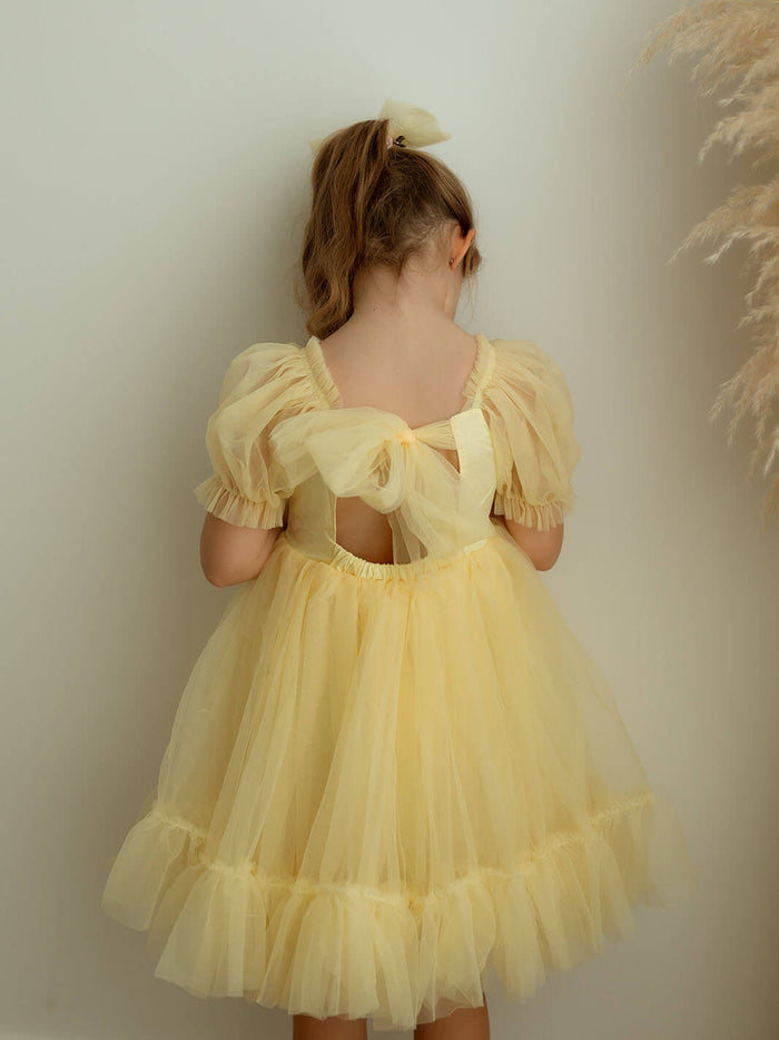 The back of our Gabrielle lemon flower girl dress.