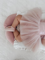 Soft tulle skirt of Gigi baby flower girl dress in dusty pink.