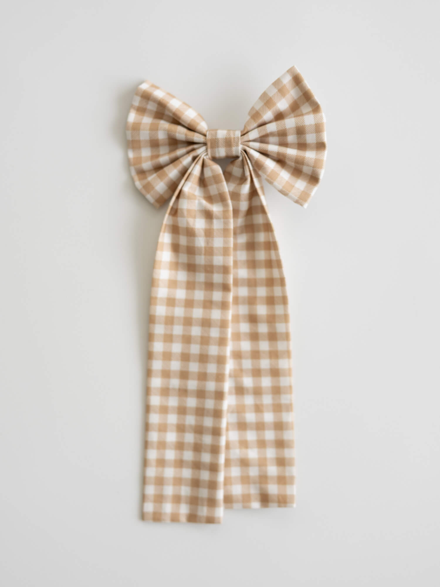 Girls medium Gingerbread plaid bow.