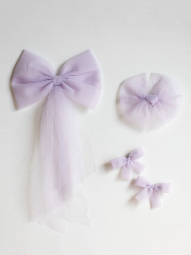 Girls lilac purple tulle hair bows.