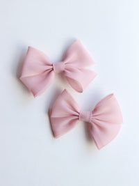 Girls blush organza bow hair clip, a perfect match to our Cleo blush organza flower girl dress.