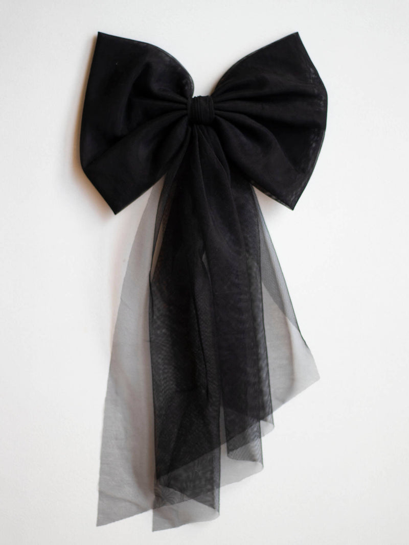 Large black tulle hair bow.