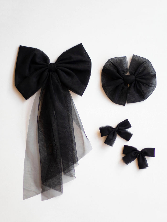 Black tulle hair bows in three sizes.