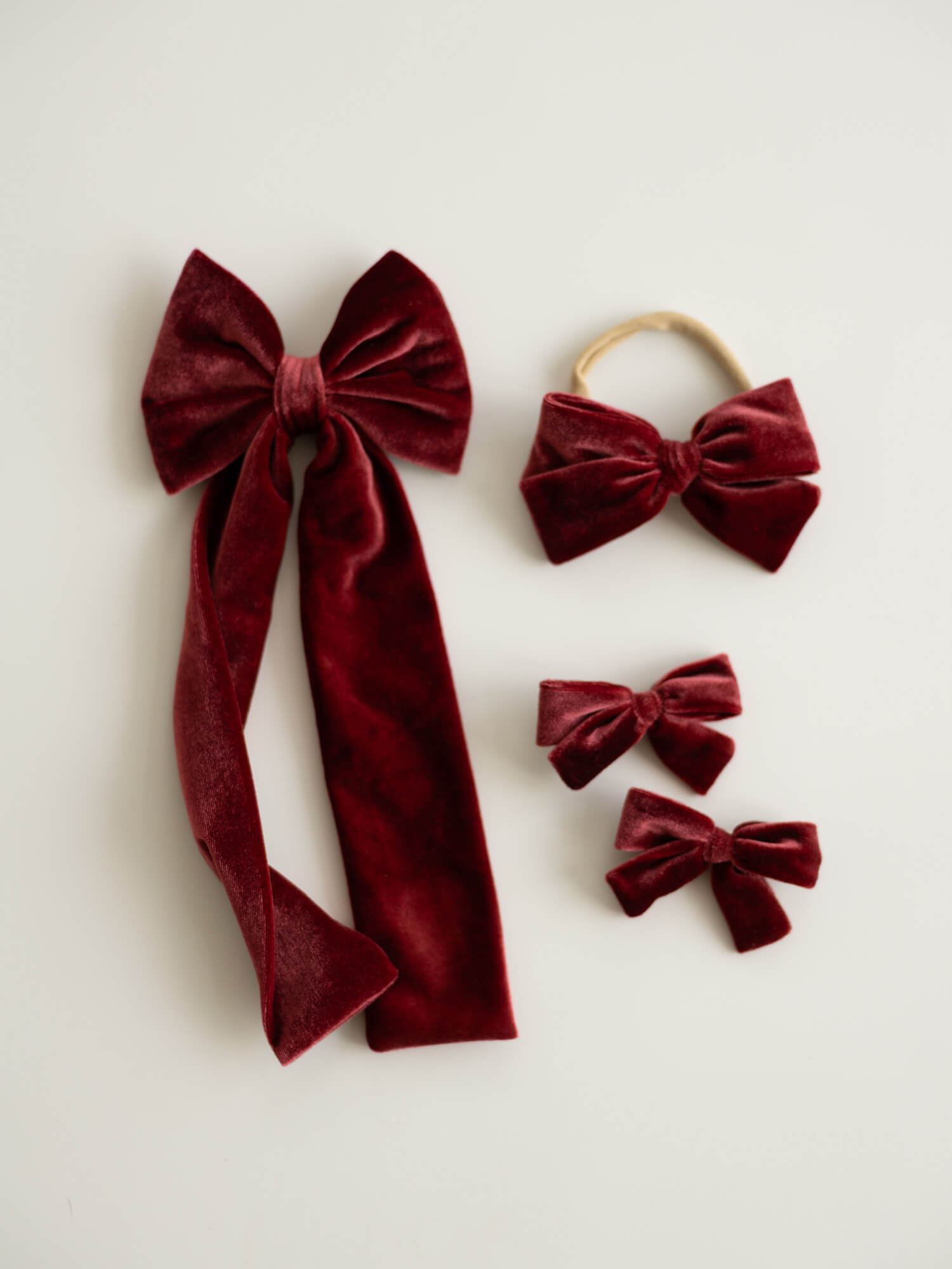 Velvet Christmas hair bows in crimson red.
