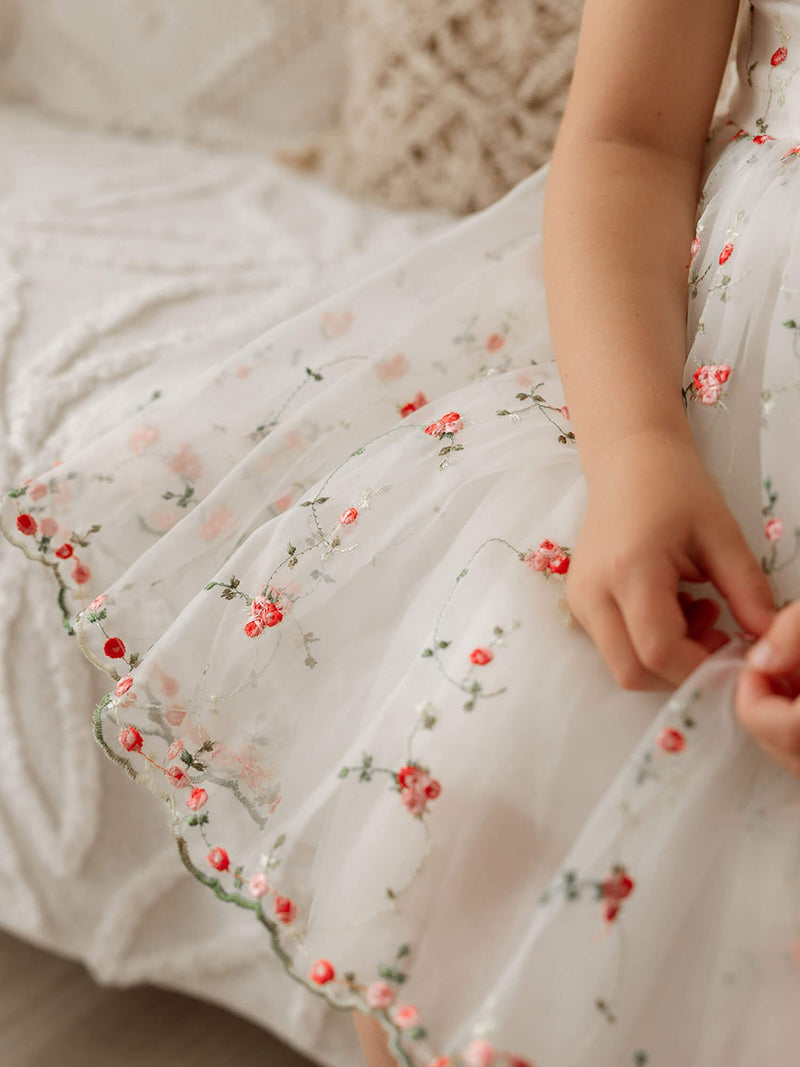 Details of the red floral organza used to make our Layla girls Christmas dress.