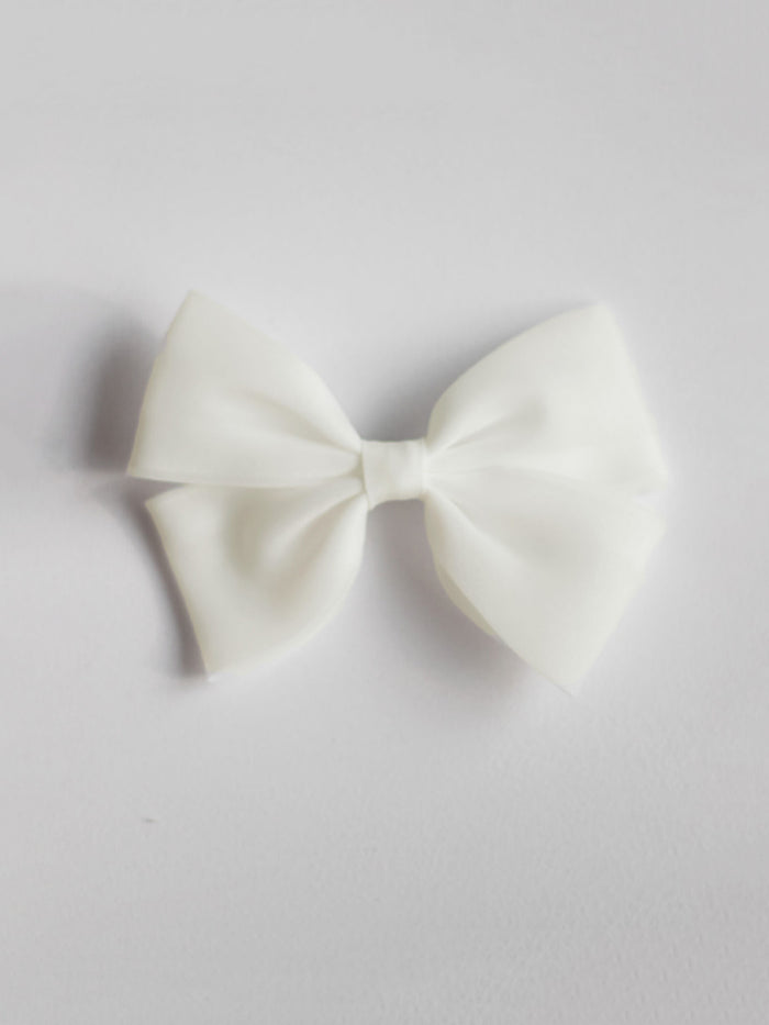 Cream organza bow hair clip.