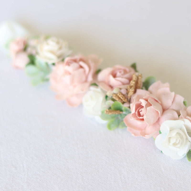 Details of our Amelie baby floral headband shown close up. 