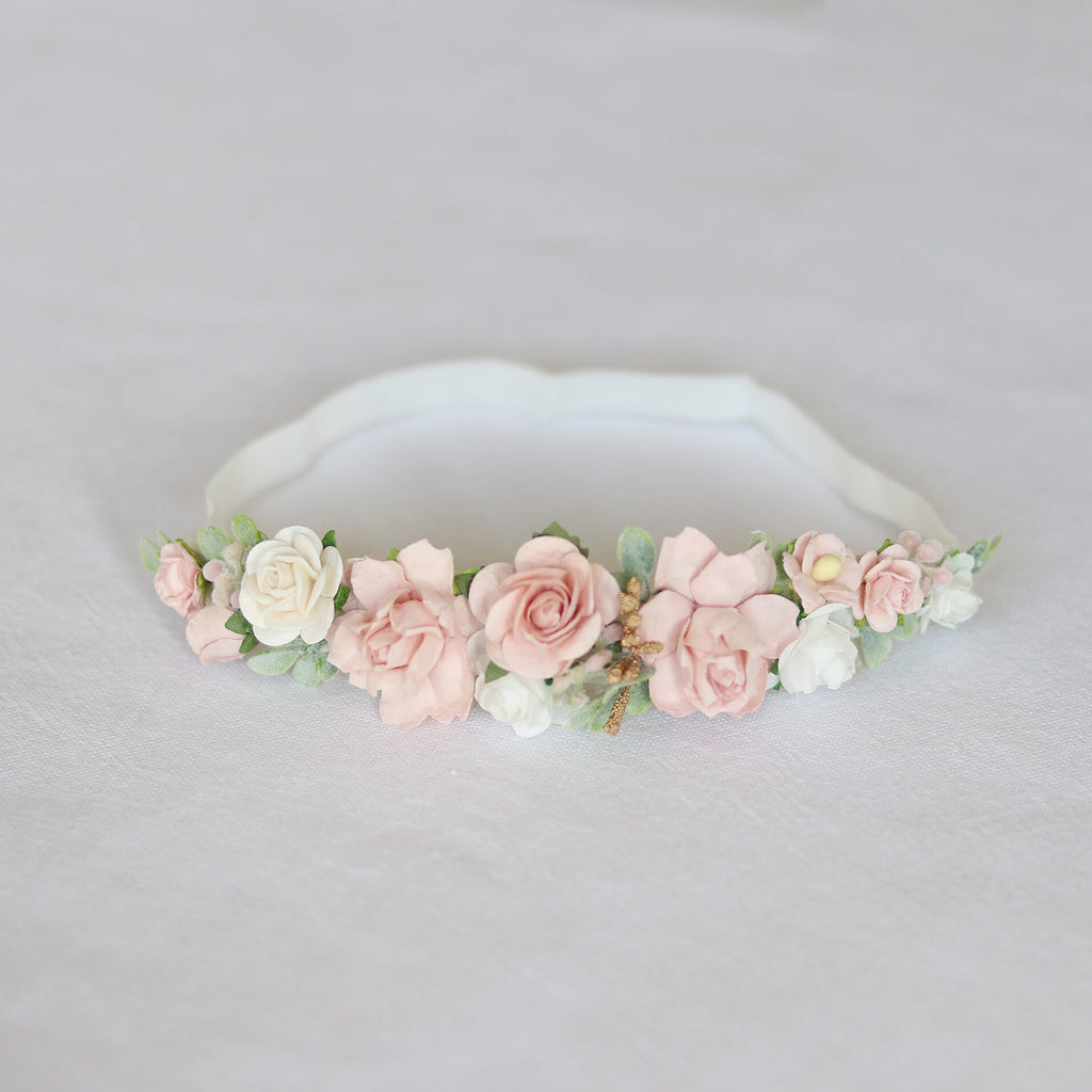 Baby floral headband in blush and ivory pink studio image shown from the front.