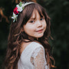 Aubrey wine and ivory floral headband shown on a young girl. She also wears our Lumi flower girl dress.