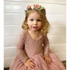 Toddler wears our Willow dusty rose flower girl dress and Amelie flower crown.