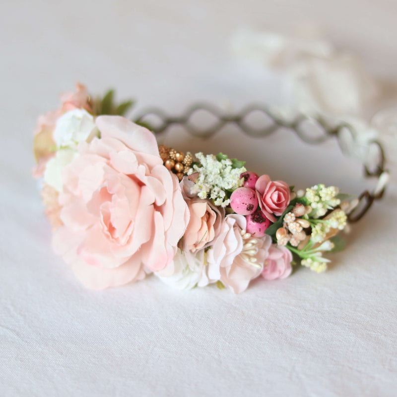 Aria peach blush flower crown for flower girls and birthday parties shown from the side, showing floral details.