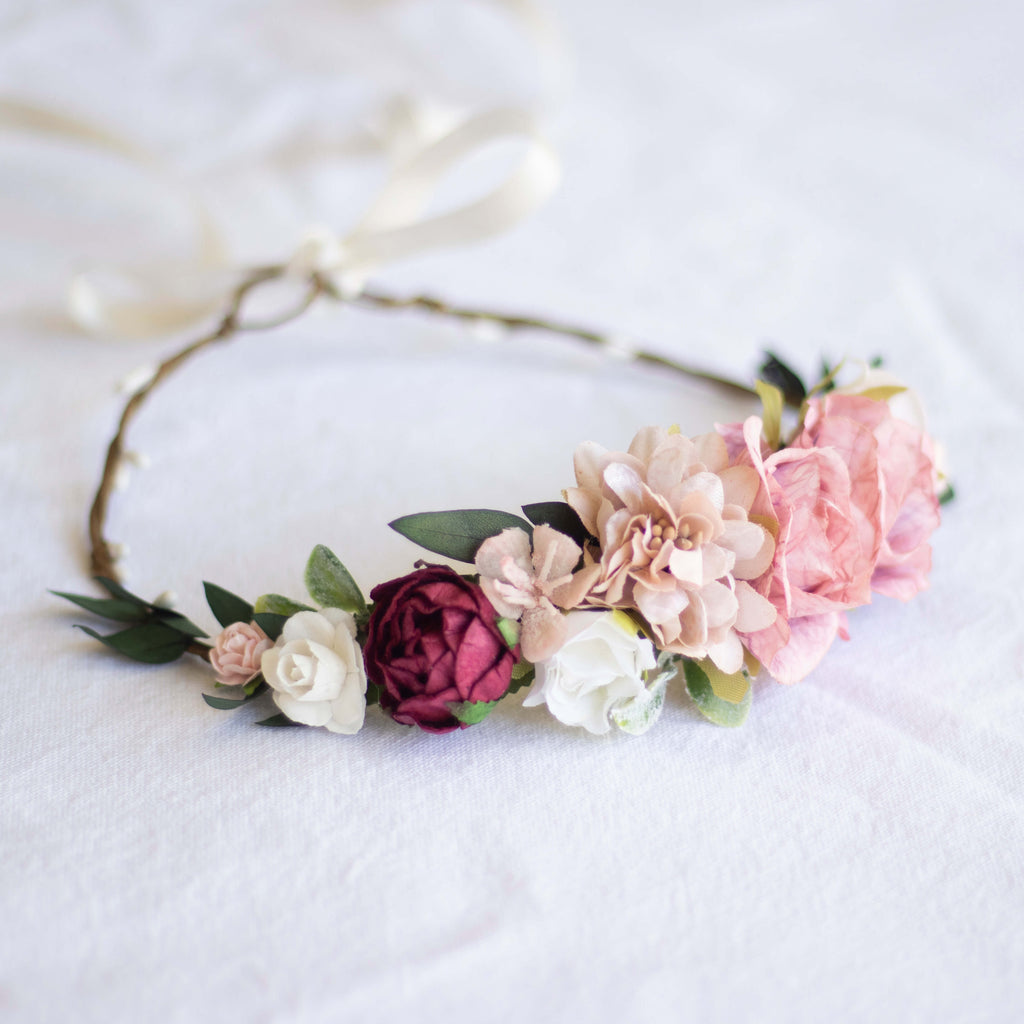 Audrey flower crown from the front, made up of taupe, pink, ivory and wine coloured blooms.