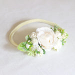 Side view of Delilah ivory floral headband. A girls headband style flower crown.