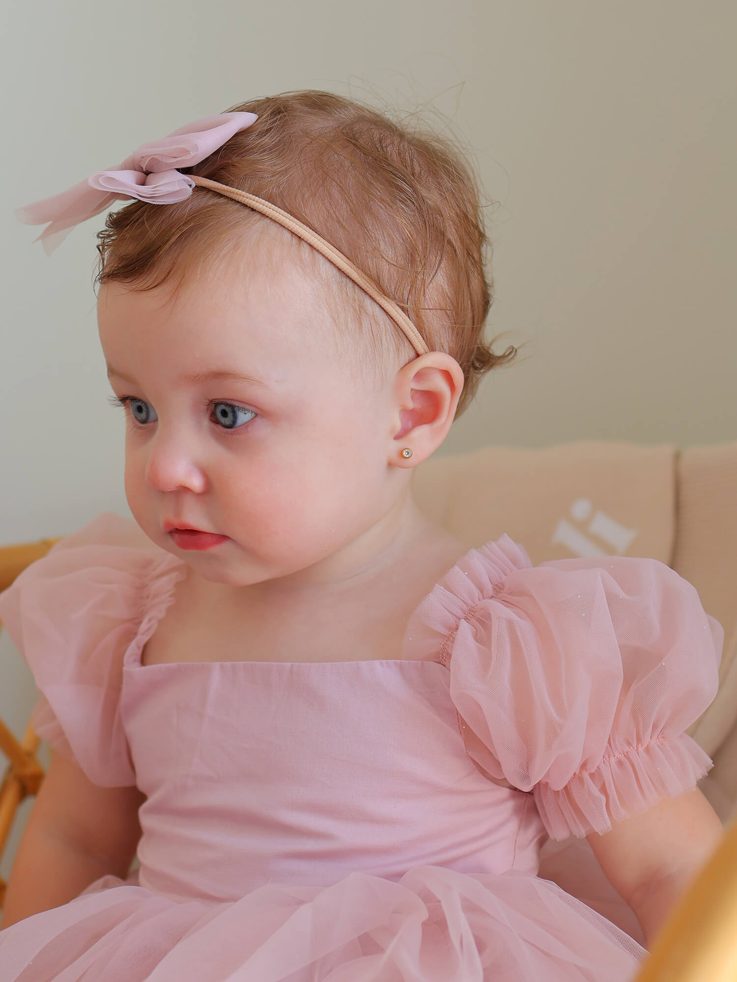 Gabrielle tulle puff sleeve romper for baby flower girls in dusty pink.