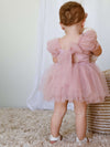 Gabrielle baby flower girl dress in dusty pink, shown from the back, showing tulle bow back.