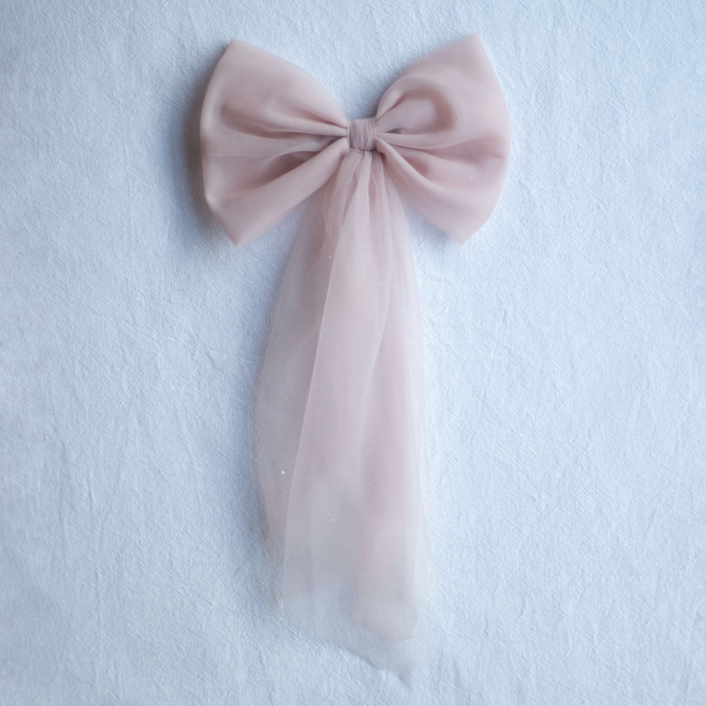 Dusty pink tulle bows in three different styles.