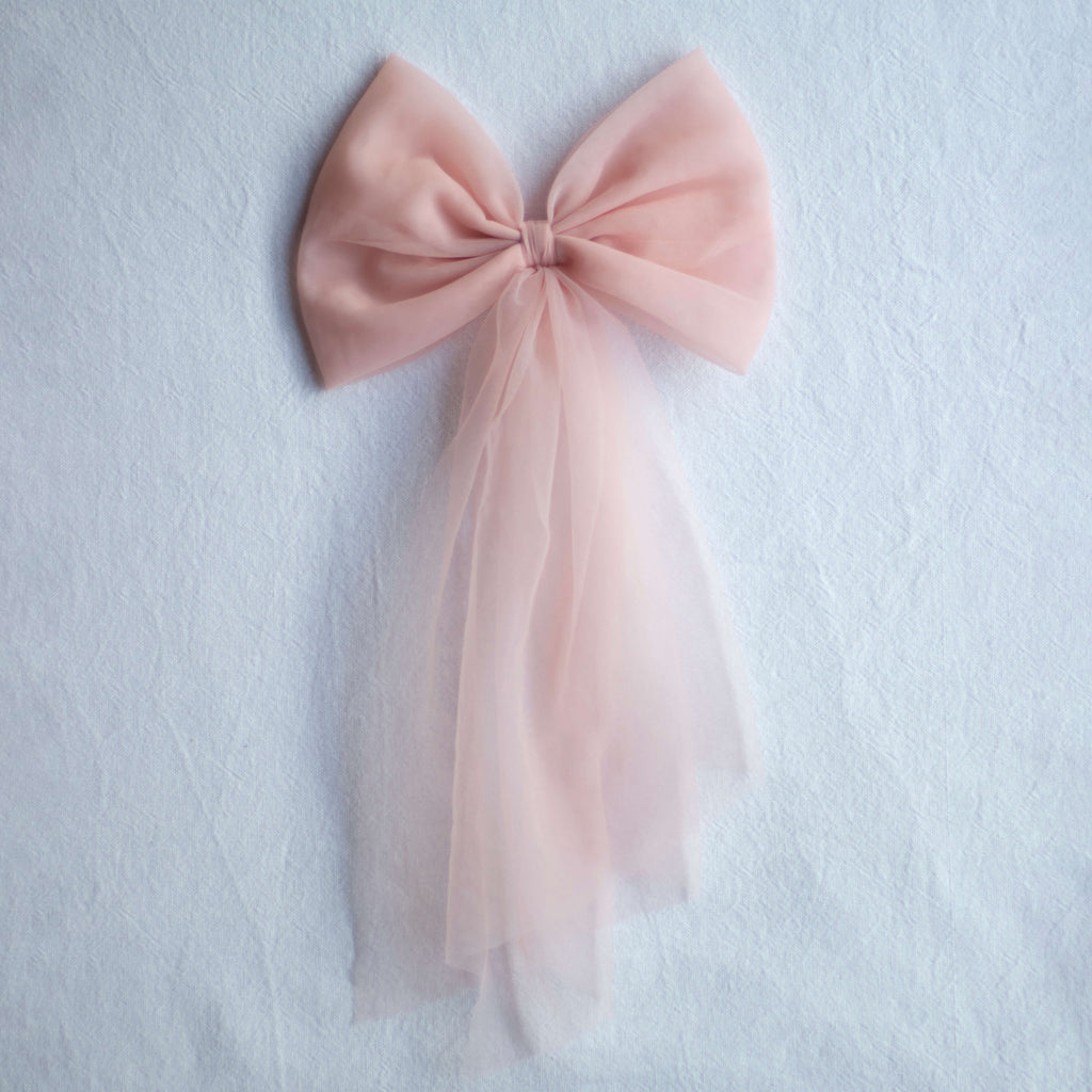 Tulle bows in peachy blush, in three different styles.