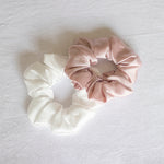 Girls and women's mulberry silk scrunchies in ivory and blush.