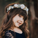 Ivory Sage flower crown worn by a young girl. She also wears our Willow flower girl dress.