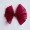 Crimson tulle christmas bow, medium size.
